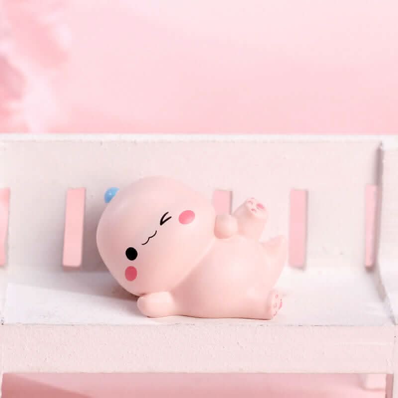 Petits ornements dinosaures en résine