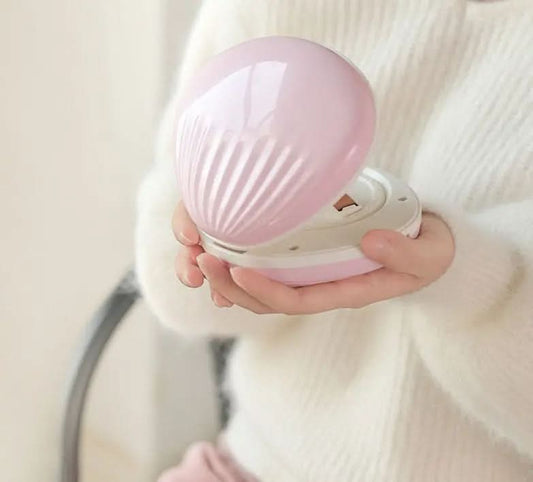 Projecteur lumineux arc-en-ciel en forme de coquillage Les Visionnaires