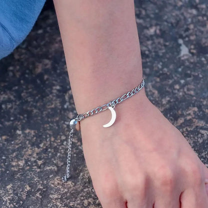 Lot de 2 bracelets magnétiques en acier inoxydable avec breloque soleil et lune Les Visionnaires