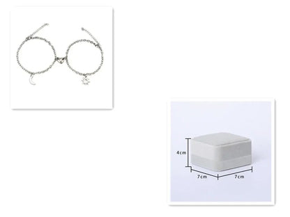 Lot de 2 bracelets magnétiques en acier inoxydable avec breloque soleil et lune Les Visionnaires