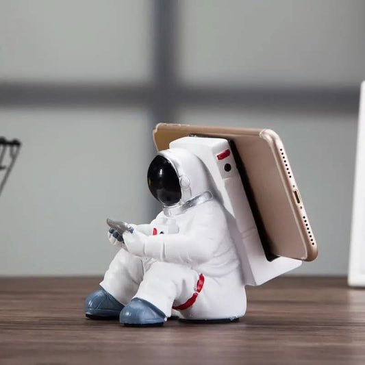 Support de téléphone portable simple et créatif. Astronaute Les Visionnaires