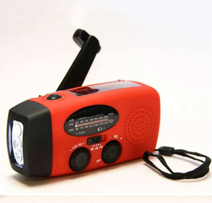 Lampe de poche radio solaire à manivelle avec chargement USB Les Visionnaires