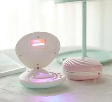 Projecteur lumineux arc-en-ciel en forme de coquillage Les Visionnaires