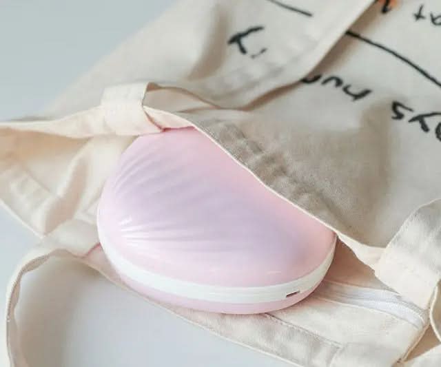 Projecteur lumineux arc-en-ciel en forme de coquillage Les Visionnaires