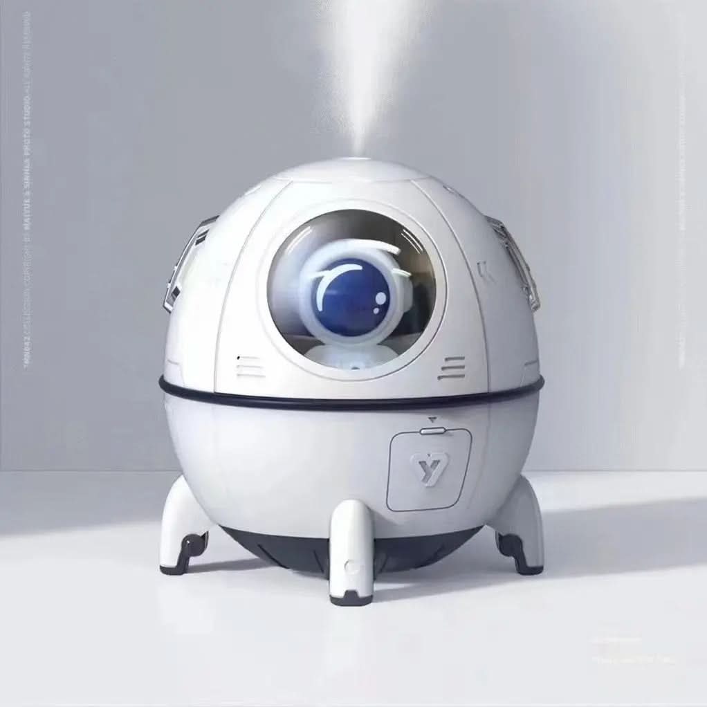 Humidificateur USB en forme d’astronaute – lumière douce, diffusion aromatique, brume froide silencieuse, usage décoratif pour chambre ou bureaue Les Visionnaires