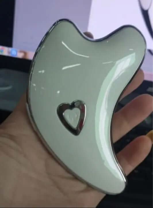 Gua Sha électrique avec lumière LED et microcourant Les Visionnaires