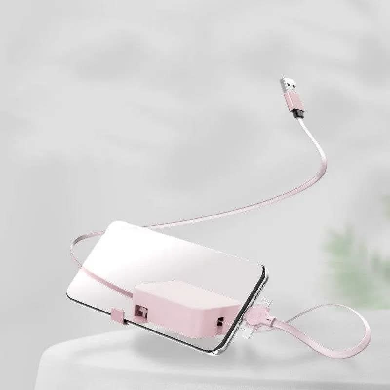 Câble USB rétractable multi-connecteur rose avec smartphone pour charge et transfert de données